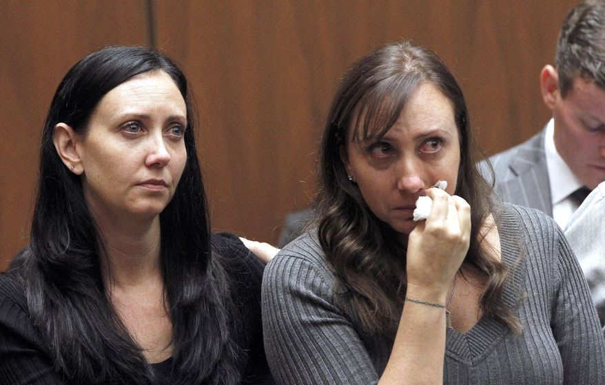Evin Collins, and Bonnie Stow, sisters of beating victim Bryan Stow are shown during a hearing Thursday Feb. 20, 2014 in Los Angeles. Two men, Marvin Norwood, and Louie Sanchez pleaded guilty Thursday to a 2011 beating at Dodger Stadium that left San Francisco Giants fan Stow brain damaged and disabled. The pair were immediately sentenced by an angry judge who called them cowards and the sort of people that sports fans fear when they go to games.(AP Photo/Nick Ut )