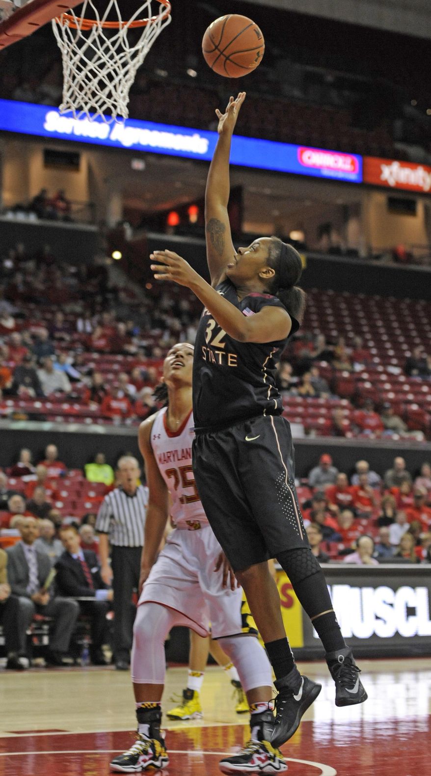 Florida State's Lauren Coleman, right, shoots in front of Maryland's Alyssa Coleman in the first half of an NCAA college basketball game Thursday, Feb. 20, 2014, in College Park, Md. (AP Photo/Gail Burton)