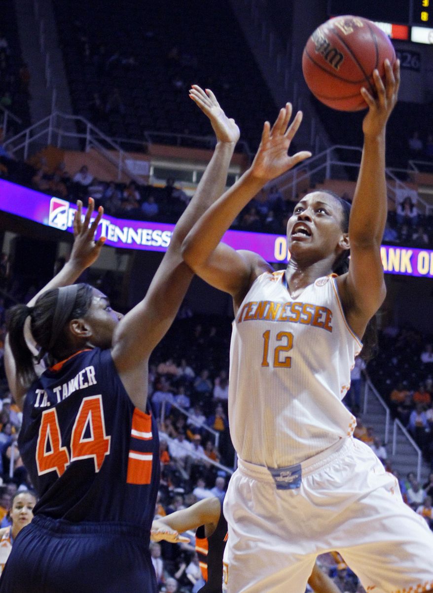 Tennessee forward Bashaara Graves (12) shoots over Auburn center Tra'Cee Tanner (44) in the first half of an NCAA college basketball game, Thursday, Feb. 20, 2014, in Knoxville, Tenn. (AP Photo/Wade Payne)