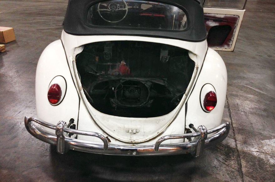 In a handout photo provided by the Customs and Border Protection, a 1965 Volkswagen Beetle stolen 40 years ago in Tennessee is seen in Detroit. Federal agents making a routine check of the car’s paperwork learned that the car was reported stolen in Knoxville in 1974. Customs and Border Protection spokesman Ken Hammond says agents made the discovery Jan. 30 as it was being shipped by rail to Canada from Detroit. Hammond says the Beetle was going to be restored in Finland. (AP Photo/Customs and Border Protection,)