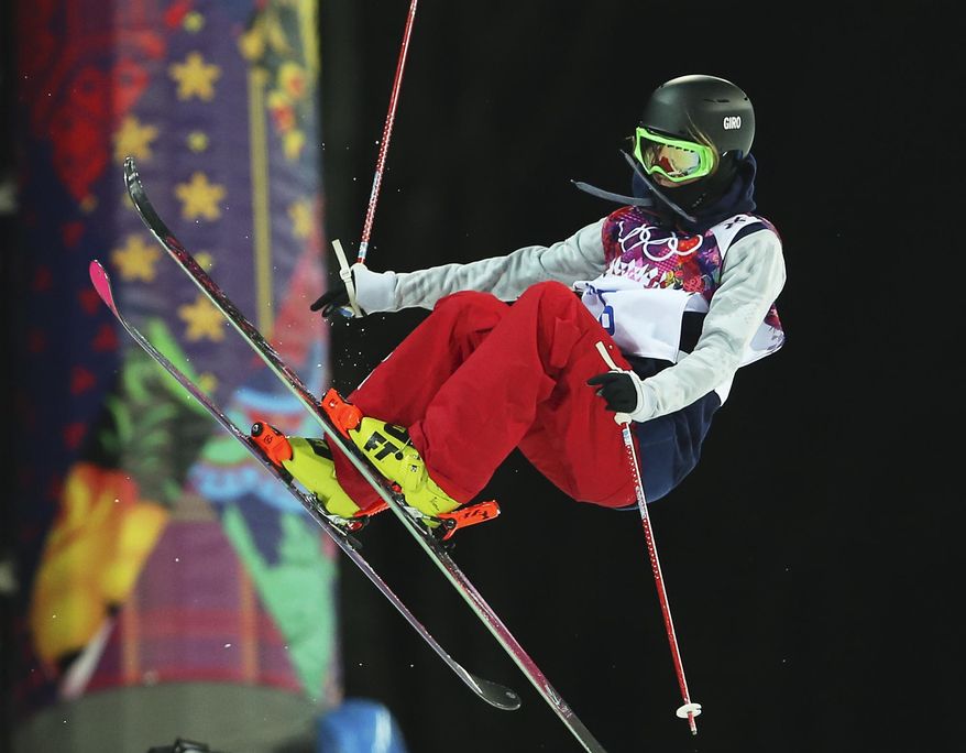 Brita Sigourney of the United States gets air during women's ski halfpipe qualifying at the Rosa Khutor Extreme Park, at the 2014 Winter Olympics, Thursday, Feb. 20, 2014, in Krasnaya Polyana, Russia. (AP Photo/Sergei Grits)