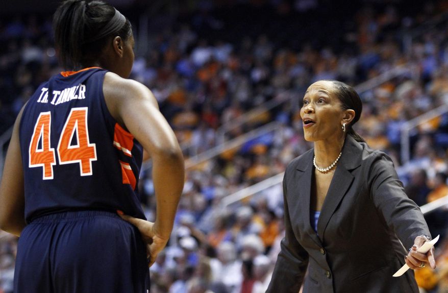 Auburn head coach Terri Williams-Flournoy gives instructions to center Tra'Cee Tanner (44) in the first half of an NCAA college basketball game against the Tennessee, Thursday, Feb. 20, 2014, in Knoxville, Tenn. (AP Photo/Wade Payne)