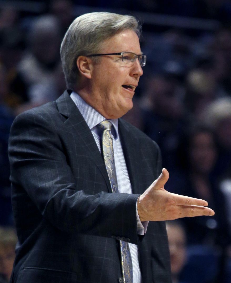 Iowa head coach Fran McCaffery talks to an official during the second half of an NCAA college basketball game against Penn State on Saturday, Feb. 15, 2014, in State College. Iowa won 82-70. (AP Photo/Keith Srakocic)