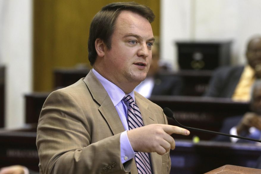 Rep. John Burris, R-Harrison, speaks for passage of continued funding of the state's "Private Option" Medicaid plan in the House chamber at the Arkansas state Capitol in Little Rock, Ark., Thursday, Feb. 20, 2014. A compromise plan for Medicaid expansion in Arkansas remained stalled in the state House. (AP Photo/Danny Johnston)