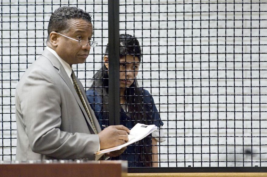 Vanesa Zavala appears in a Westminster courtroom with her attorney, Ken Reed, for a arraignment hearing Friday, Feb. 21, 2014 in Westminster, Calif. Zavala and Candace Brito are facing charges in the beating death of Annie Hung Pham in front of a Santa Ana nightclub in January. (AP Photo/The Orange County Register, Joshua Sudock, Pool)