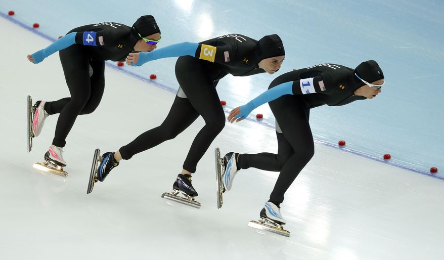 Speedskaters from the U.S. Jilleanne Rookard, Heather Richardson and Brittany Bowe, left to right, compete in the women's speedskating team pursuit quarterfinals at the Adler Arena Skating Center during the 2014 Winter Olympics in Sochi, Russia, Friday, Feb. 21, 2014. (AP Photo/Patrick Semansky)