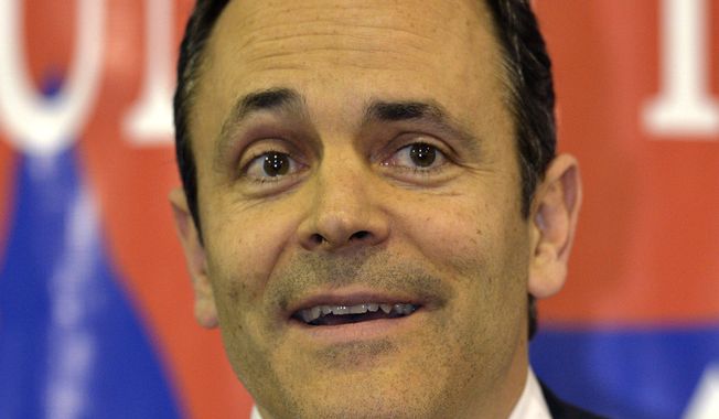 ** FILE ** Matt Bevin, Republican candidate for U.S. Senate, speaks to a gathering at the Spencer County GOP Lincoln Day Dinner on Friday, Feb. 7, 2014, in Fisherville, Ky. Bevin is running against Mitch McConnell R-Ky. (AP Photo/Timothy D. Easley)