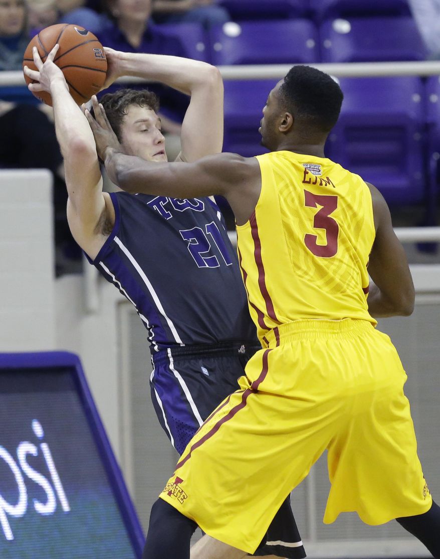 TCU guard Hudson Price (21) keeps the ball away from Iowa State forward Melvin Ejim (3) during the first half of an NCAA college basketball game Saturday, Feb. 22, 2014, in Fort Worth, Texas. (AP Photo/LM Otero)