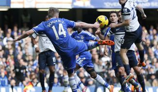 Chelsea&#x27;s Andre Schurrle shoots the ball during an English Premier League soccer match against Everton at the Stamford Bridge ground in London, Saturday, Feb. 22, 2014. Chelsea won the match 1-0. (AP Photo/Lefteris Pitarakis)