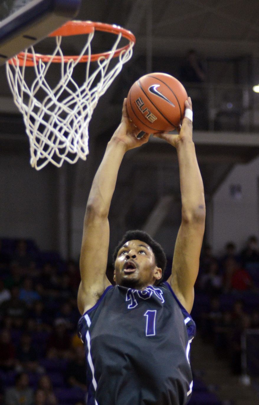 TCU's Karviar Shepherd dunks the ball against Iowa State during the first half of an NCAA college basketball game, Saturday, Feb. 22, 2014 in Fort Worth, Texas. (AP Photo/The Fort Worth Star-Telegram, Bob Haynes)  MAGS OUT; (FORT WORTH WEEKLY, 360 WEST); INTERNET OUT