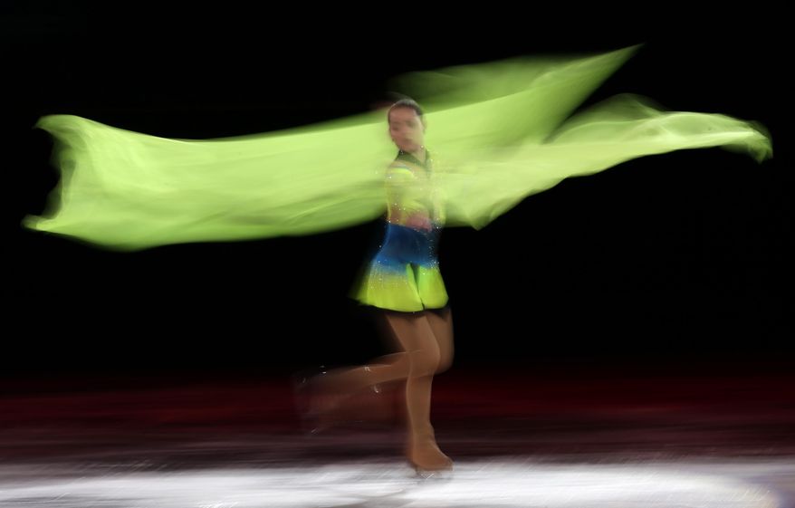 Adelina Sotnikova of Russia performs during the figure skating exhibition gala at the Iceberg Skating Palace during the 2014 Winter Olympics, Saturday, Feb. 22, 2014, in Sochi, Russia. (AP Photo/Bernat Armangue)