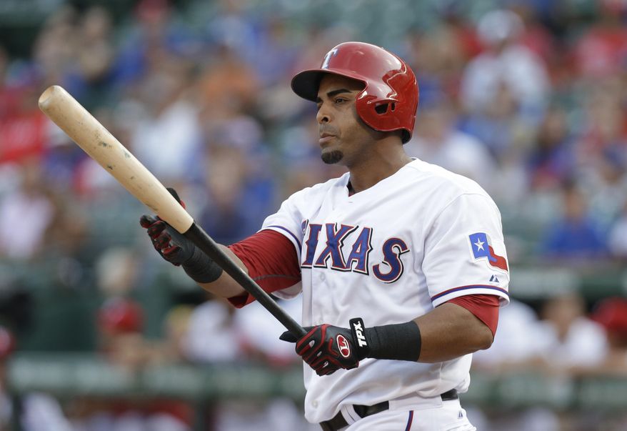 In this Aug. 1, 2013, photo, Texas Rangers&#x27; Nelson Cruz prepares for his at-bat during the second inning of a baseball game against the Arizona Diamondbacks in Arlington, Texas. A person familiar with the deal tells The Associated Press that Cruz, a free agent, and the Baltimore Orioles have reached agreement on a one-year contract. The person spoke Saturday, Feb. 22, 2014, on condition of anonymity because the contract was not complete. Cruz will earn about $8.5 million, and can make more in performance bonuses. Other media outlets had reported a deal was in place. (AP Photo/LM Otero)
