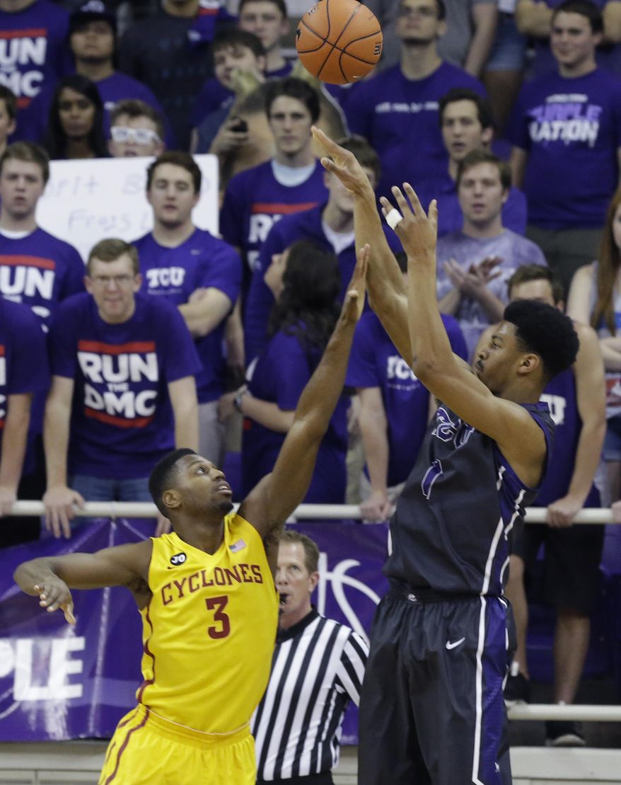 TCU center Karviar Shepherd (1) shoots against Iowa State forward Melvin Ejim (3) during the first half of an NCAA college basketball game Saturday, Feb. 22, 2014, in Fort Worth, Texas. (AP Photo/LM Otero)
