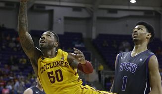 Iowa State guard DeAndre Kane (50) shoots past TCU center Karviar Shepherd (1) during the first half of an NCAA college basketball game Saturday, Feb. 22, 2014, in Fort Worth, Texas. (AP Photo/LM Otero)