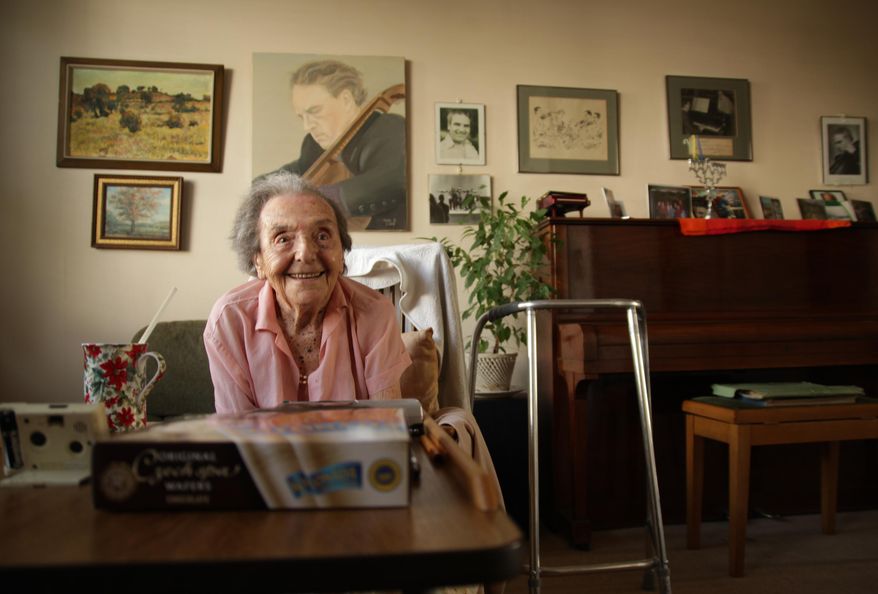 RETRANSMITS TO ADD CREDIT IN SIGNOFF - Photo dated July 2010 made available by the makers of the Oscar nominated documentary The Lady in Number 6, in which she tells her story, of Alice Herz-Sommer, believed to be the oldest-known survivor of the Holocaust, who died in London on Sunday morning at the age of 110. Herz-Sommer’s devotion to the piano and to her son sustained her through two years in a Nazi prison camp. (AP Photo/The Lady in Number 6, Bunbury Films)