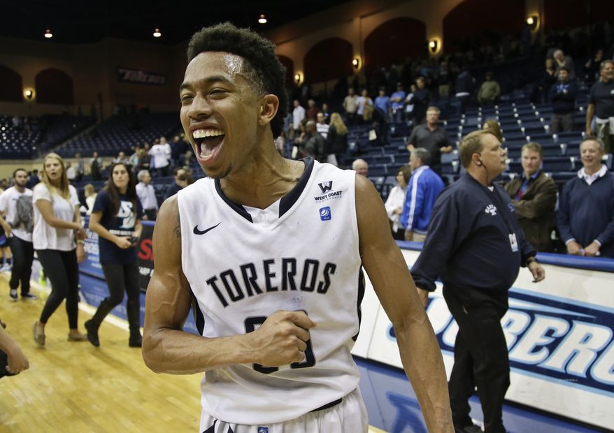 San Diego guard Christopher Anderson celebrates after San Diego's 69-66 victory over Gonzaga in a NCAA college basketball game Saturday, Feb. 22, 2014, in San Diego. (AP Photo/Lenny Ignelzi)