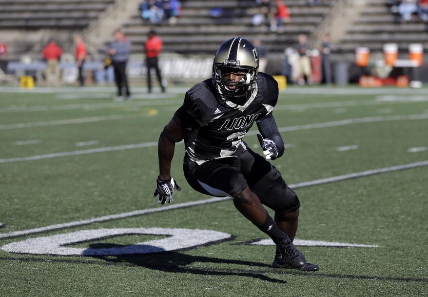 FILE - In this Nov. 9, 2013 file photo, Lindenwood cornerback Pierre Desir warms up before the start of an NCAA football game against Pittsburg State in St. Charles, Mo. Desir starts working out Tuesday, Feb. 25, 2014, at Lucas Oil Stadium with the other defensive backs at the NFL’s scouting combine. (AP Photo/Jeff Roberson, File)