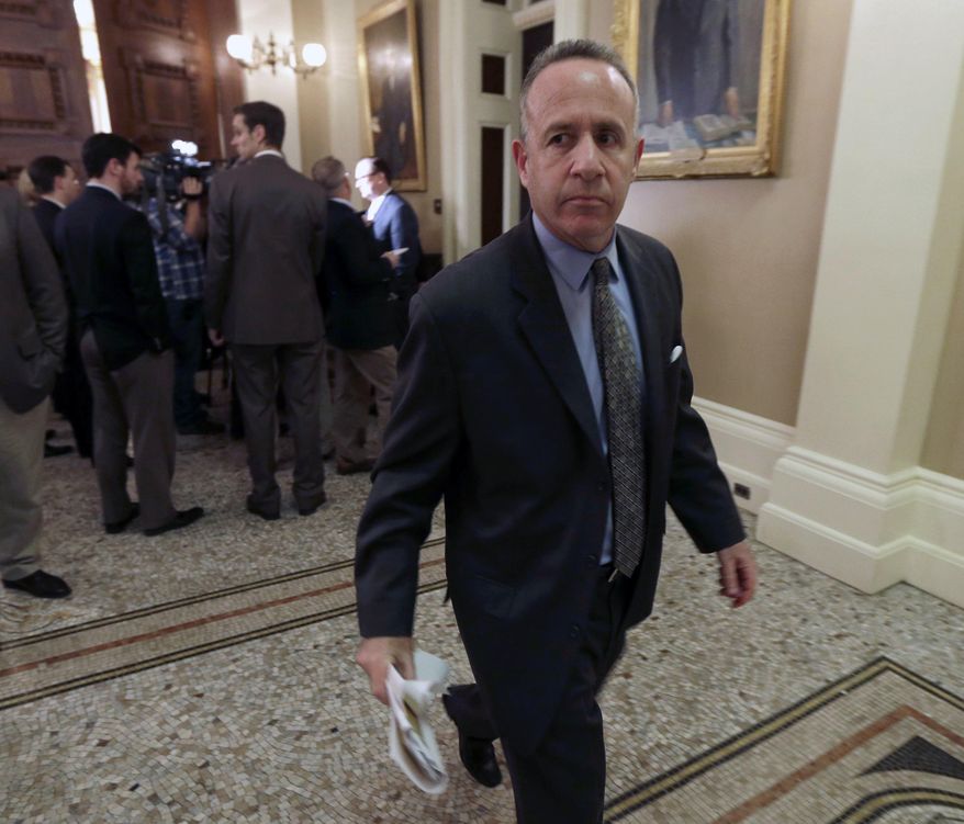 State Senate President Pro Tem Darrell Steinberg, D-Sacramento, walks to his Capitol office after the Senate session where Democratic lawmakers decided to give Sen. Ron Caldron, D-Montebello, who is facing corruption charges, one week to resign or risk being suspended, Monday Feb. 24, 2014. Calderon was arraigned Monday in Los Angeles on charges that he accepted $100,000 in bribes and trips. (AP Photo/Rich Pedroncelli)
