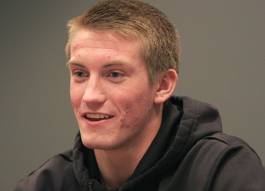 In a Saturday, Feb. 22, 2014 photo, Rogers High School senior Reid Sagehorn speaks about his suspension at attorney Joe Friedberg's office in Minneapolis. Sagehorn, who was suspended for seven weeks for tweeting, jokingly, he says, that he had kissed a teacher is transferring. Sagehorn didn't disclose where he would begin school Monday. (AP Photo/The Star Tribune, Mark Vancleave) MANDATORY CREDIT; ST. PAUL PIONEER PRESS OUT; MAGS OUT; TWIN CITIES TV OUT