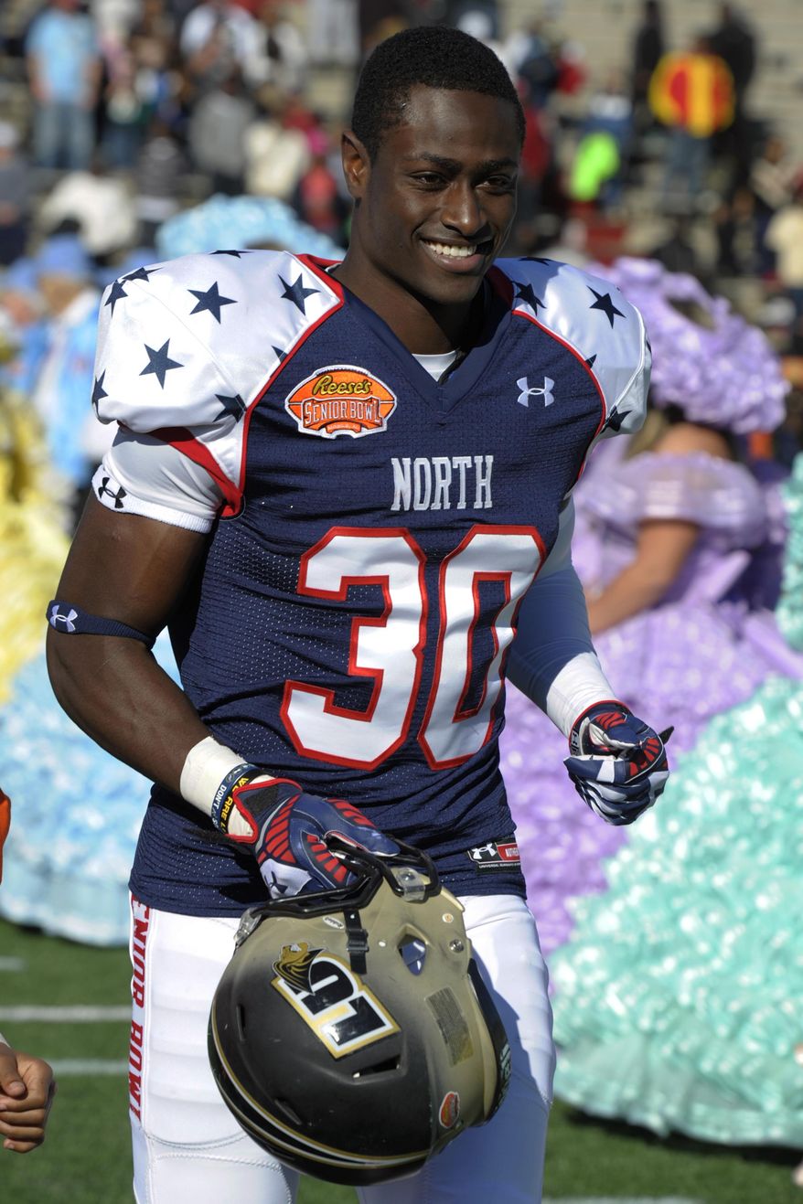 FILE - In this Jan. 25, 2014 file photo, North defensive corner Pierre Desir (30), of Lindenwood, runs on to the field before the Senior Bowl NCAA college football game in Mobile, Ala. Desir starts working out Tuesday, Feb. 25, 2014, at Lucas Oil Stadium with the other defensive backs at the NFL’s scouting combine. (AP Photo/G.M. Andrews, File)