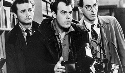 Shown in this scene from the 1984 movie &quot;Ghostbusters&quot; are Bill Murray, Dan Aykroyd, center, and Harold Ramis.  (AP Photo)