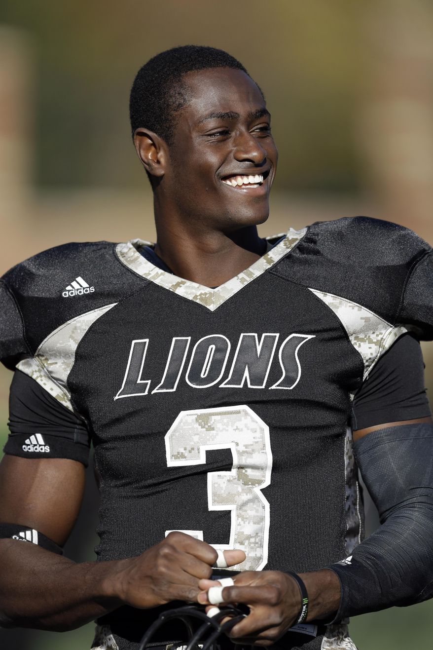 FILE - In this Nov. 9, 2013 file photo, Lindenwood cornerback Pierre Desir smiles on the sideline before the start of an NCAA football game against Pittsburg State in St. Charles, Mo. Desir starts working out Tuesday, Feb. 25, 2014, at Lucas Oil Stadium with the other defensive backs at the NFL’s scouting combine. (AP Photo/Jeff Roberson, File)