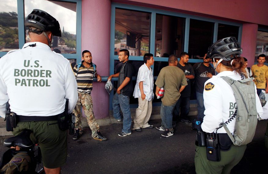 ** FILE ** Illegal immigrants have been the focus of much debate. (Associated Press)