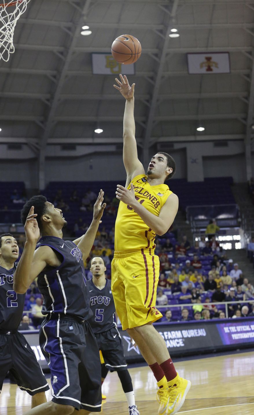 Iowa State forward Georges Niang (31) shoots against TCU center Karviar Shepherd (1) during the first half of an NCAA college basketball game Saturday, Feb. 22, 2014, in Fort Worth, Texas. Iowa State won 71-60.(AP Photo/LM Otero)