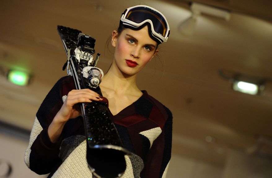 A model presents a creation for Christine Phung's ready to wear fall/winter 2014-2015 fashion collection presented in Paris, Tuesday, Feb.25, 2014. (AP Photo/Zacharie Scheurer)