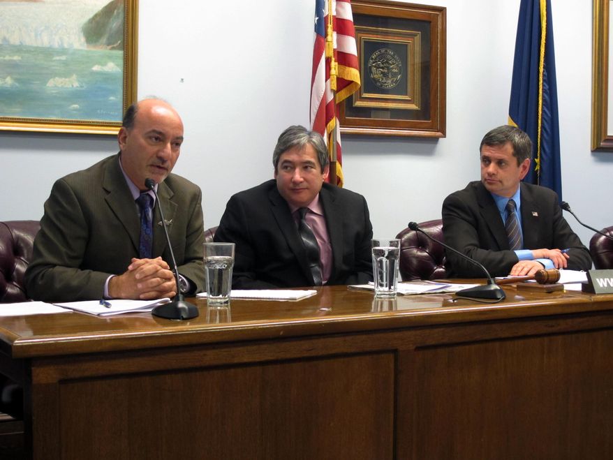Rep. Les Gara, D-Anchorage, left, addresses reporters during a House minority news conference on Tuesday, Feb. 25, 2014, in Juneau, Alaska. Also shown are Sam Kito III, center, and House Minority Leader Chris Tuck, D-Anchorage. House Democrats announced Tuesday that they had confirmed Kito to replace Juneau Democrat Beth Kerttula, who resigned from the state House in January. Democrats say Kito is expected to be sworn in on Wednesday. (AP Photo/Becky Bohrer)
