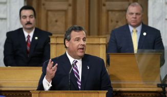As the Senate President Stephen M. Sweeney, D-West Deptford, N.J., and Assembly Speaker Vincent Prieto, D-Secaucus, N.J., listen, New Jersey Gov. Chris Christie emphasizes a point as he delivers his budget address at the Statehouse Tuesday, Feb. 25, 2014, in Trenton, N.J. Christie criticized what he calls the &quot;exploding&quot; costs of public employee pensions and health care in his fifth annual budget message Tuesday. Christie says the pension reforms enacted during his first term don&#39;t go far enough. (AP Photo/Mel Evans)