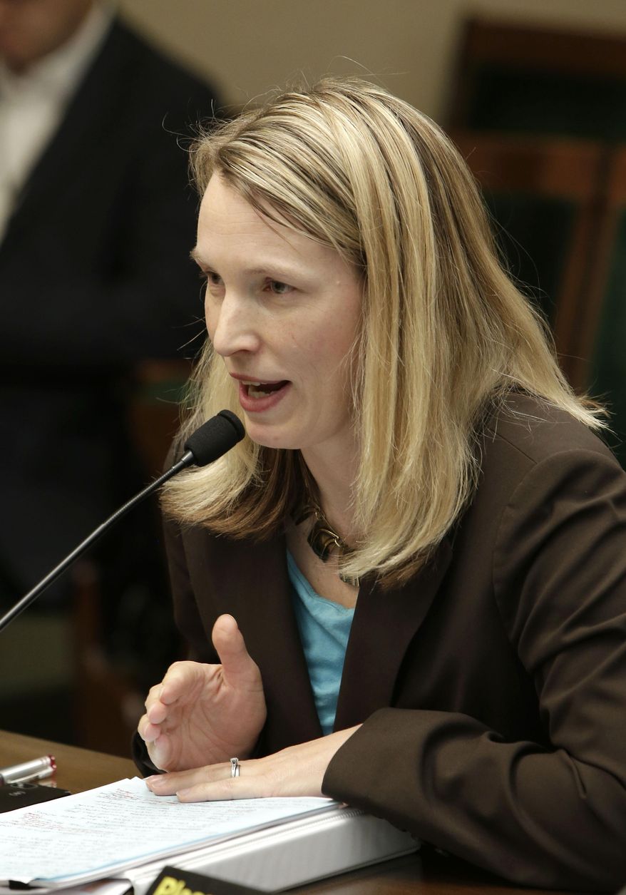Keely Bosler, of the Department of Finance, presents Gov. Jerry Brown's proposed drought-relief package before lawmakers at the Capitol in Sacramento, Calif., Wednesday Feb. 26, 2014. Members of the Assembly Budget Subcommittee No.3 on Resources and Transportation approved the package, which provides $687million that will go toward local water conservation and recycling efforts as well as food assistance in communities hit hardest by the drought. The legislation is expected to be up for a full vote of the Assembly by as early as Thursday.(AP Photo/Rich Pedroncelli)