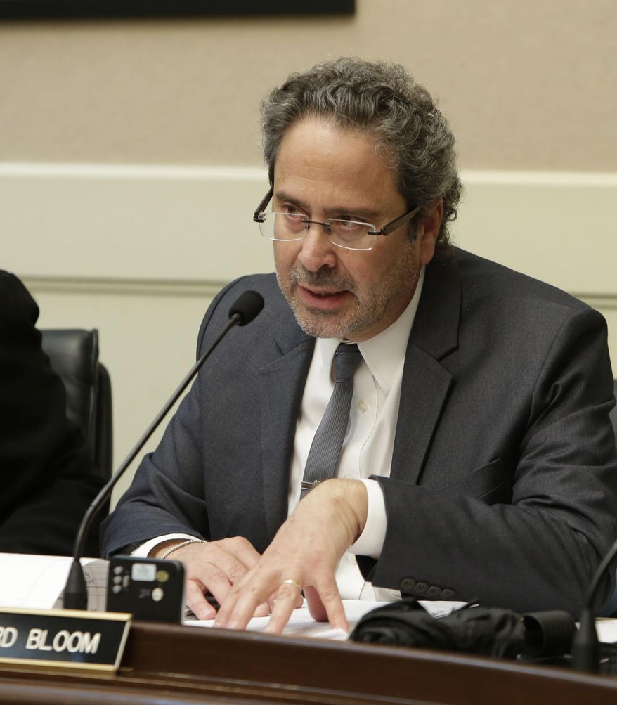 Assemblyman Richard Bloom, D-Santa Monica, chairman of the Assembly Budget Subcommittee No.3 on Resources and Transportation questions Keely Bosler, of the Department of Finance, about Gov. Jerry Brown's proposed drought-relief package before lawmakers at the Capitol in Sacramento, Calif., Wednesday Feb. 26, 2014. The committee approved the package, which provides $687million that will go toward local water conservation and recycling efforts as well as food assistance in communities hit hardest by the drought. (AP Photo/Rich Pedroncelli)