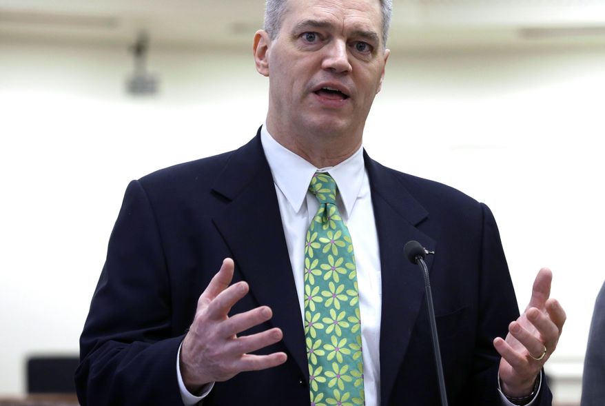 Rep. Ross Hunter talks about the supplemental budget proposal by the House Democrats, Wednesday, Feb. 26, 2014, at the Capitol in Olympia, Wash. (AP Photo/Ted S. Warren)