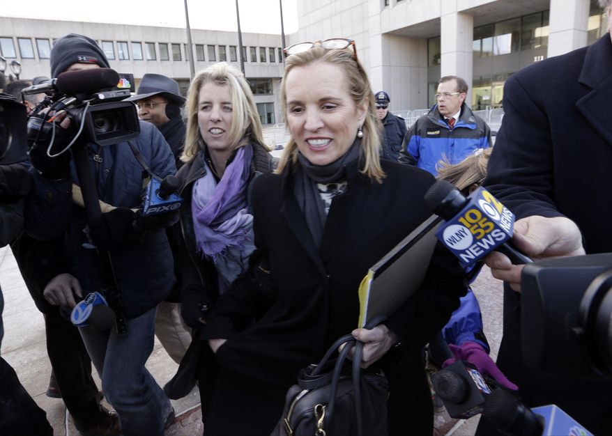 Kerry Kennedy, center, leaves Westchester County courthouse with Rory Kennedy, left, Wednesday, Feb. 26, 2014, in White Plains, N.Y. Kennedy testified at her drugged-driving trial Wednesday that she has no memory of swerving and hitting a tractor-trailer on a suburban New York highway and did not realize she was impaired when she got behind the wheel. (AP Photo/Frank Franklin II)
