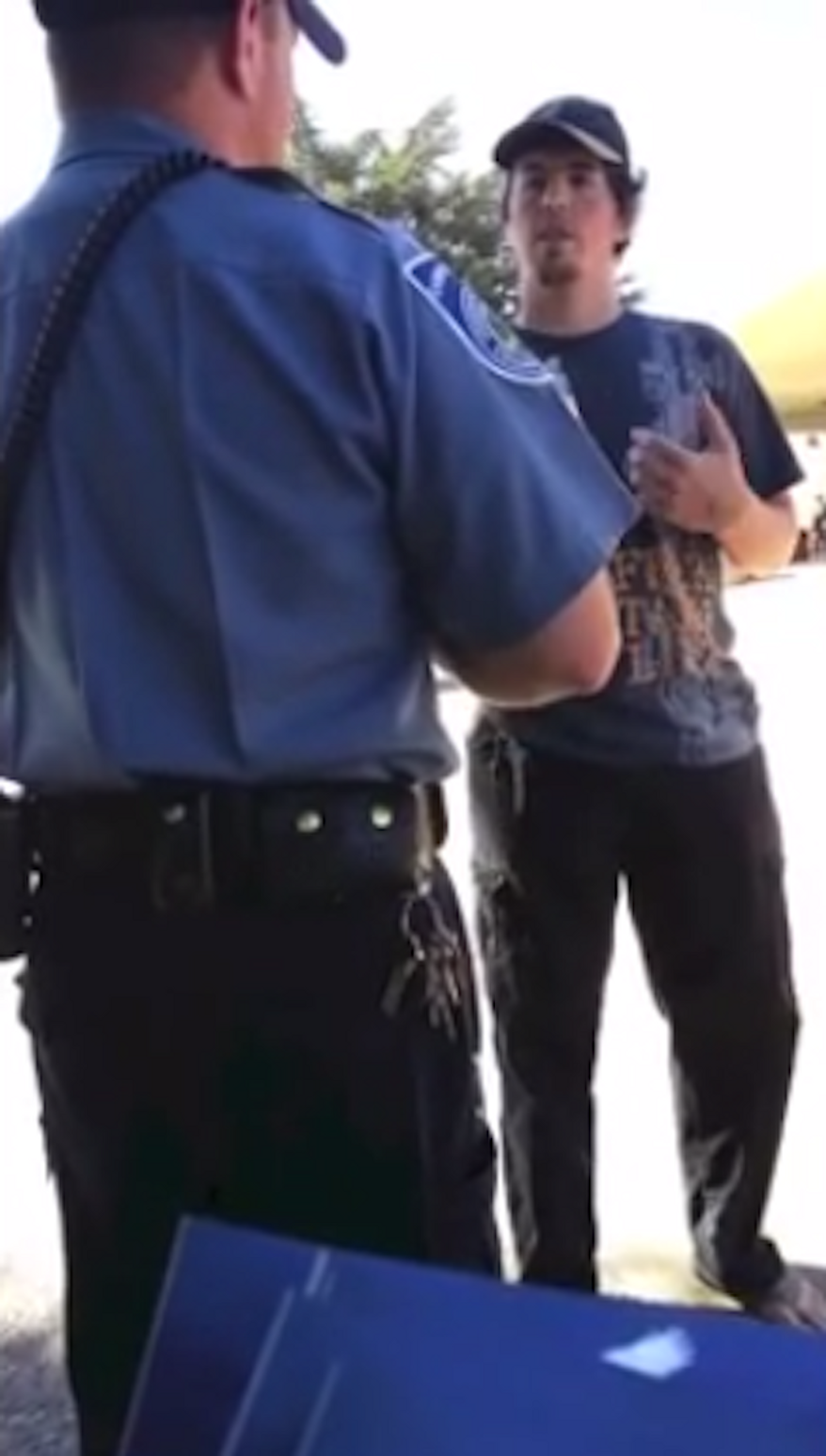 Video shot in September showed Robert Van Tuinen being confronted by a campus police officer within minutes of passing out pocket Constitutions at Modesto Junior College. (YouTube)