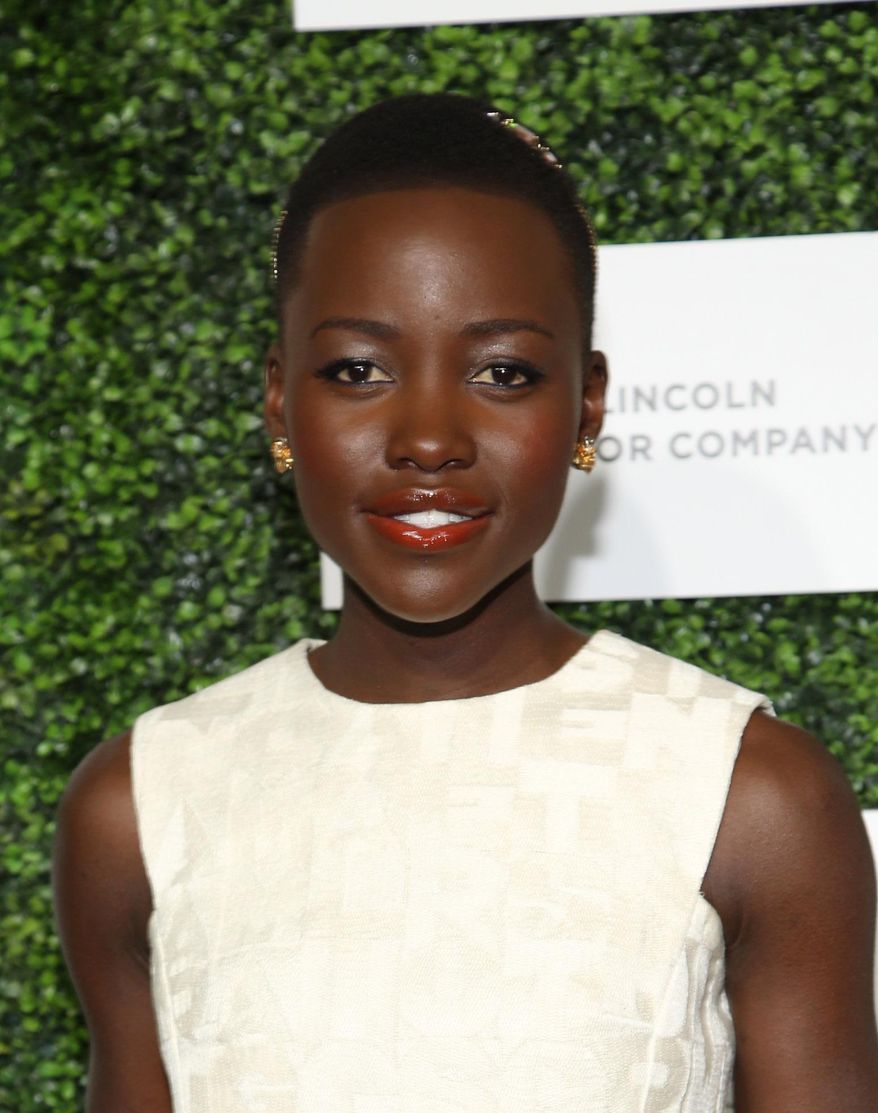 Lupita Nyong'o arrives at Essence Black Women in Hollywood Luncheon at The Beverly Hills Hotel, on Thursday, Feb. 27, 2014 in Beverly Hills, Calif. (Photo by Annie I. Bang /Invision/AP)