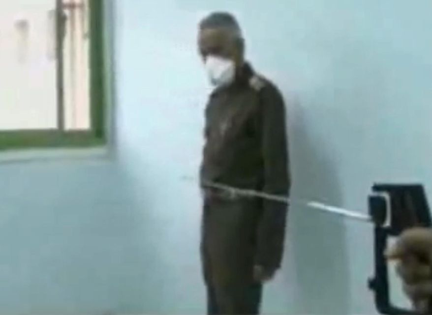 This image made from undated video broadcast on Egyptian State Television on Tuesday, Feb. 25, 2014 shows a device that the Egyptian army claims will detect and cure AIDS and Hepatitis. Egypt's military is facing embarrassment after unveiling a so-called "miraculous" invention of a set of devices that allegedly detect and cure AIDS, Hepatitis and other viruses. The army's carefully managed image as protector of the nation has suffered after many experts dismissed the claims, saying they aren't technically sound. (AP Photo via AP video)