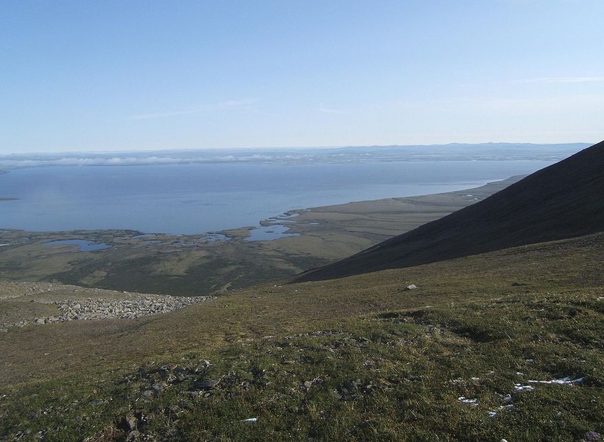 This August 2011 photo released by Graphite One Resources shows Imuruk Basin from the Graphite Creek deposit, a mineral claim being explored by Graphite One Resources north of Nome, Alaska. A surge in prices in 2012 and the hope for expanded uses for graphite in electric car batteries has spurred exploration for high-grade flake graphite in North America and around the world. (AP Photo/Graphite One Resources, Anthony Huston)