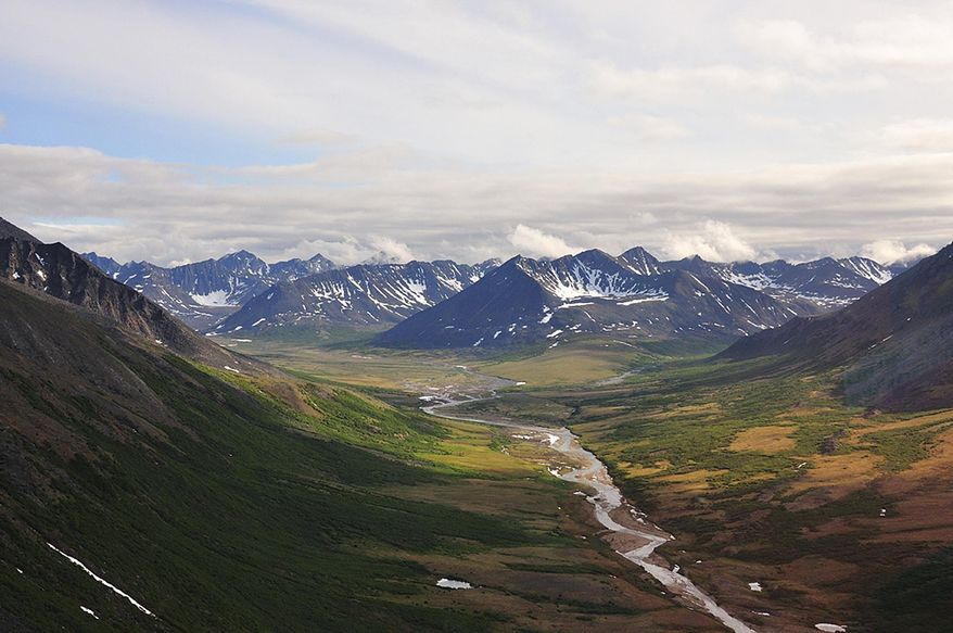 This July 2012 photo released by Graphite One Resources shows Graphite Creek, a mineral claim being explored by Graphite One Resources, that runs along the Kigluaik Mountains north of Nome, Alaska. A surge in prices in 2012 and the hope for expanded uses for graphite in electric car batteries has spurred exploration for high-grade flake graphite in North America and around the world. (AP Photo/Graphite One Resources, Jo Price)