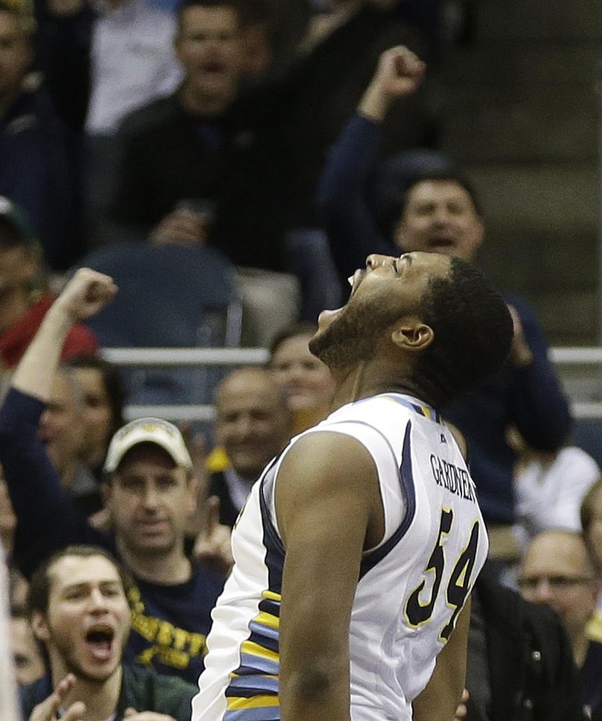Marquette's Davante Gardner reacts after scoring and being fouled by a Georgetown player during the second half of an NCAA college basketball game on Thursday, Feb. 27, 2014, in Milwaukee. (AP Photo/Jeffrey Phelps)