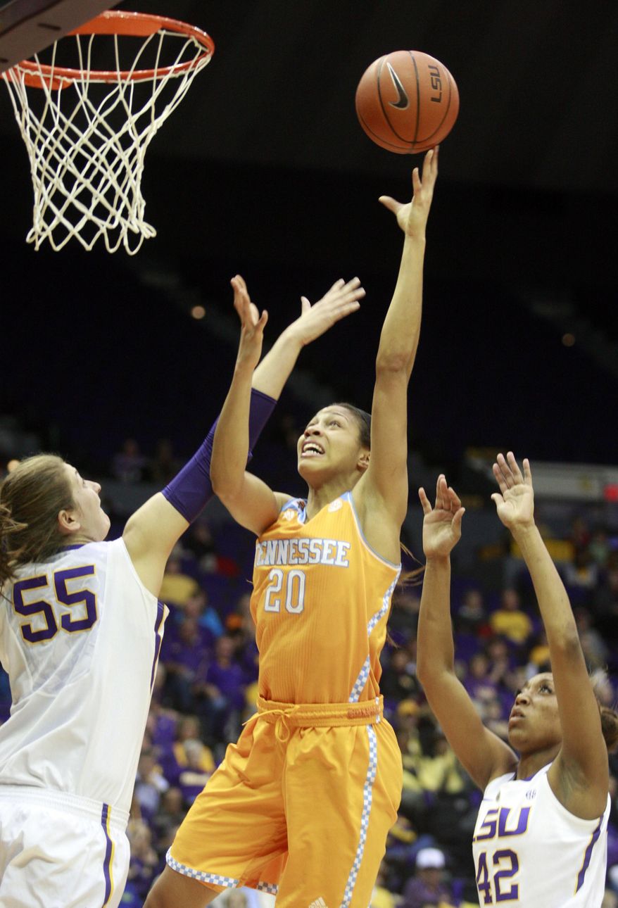 Tennessee center Isabelle Harrison (20) shoots over LSU forward Theresa Plaisance (55) in the first half of an NCAA college basketball game in Baton Rouge, La., Thursday, Feb. 27, 2014. (AP Photo/Tim Mueller)