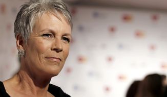 **FILE** Jamie Lee Curtis arrives in Los Angeles at the MusiCares Person of the Year gala honoring Barbra Streisand on Feb. 11, 2011. (Associated Press)