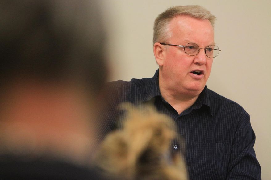 Dr. Dwight Lysne gives a sermon at Haven Ministries on Feb. 8, 2014 in Wilmington, N.C. Lysne specializes in treating patients with mental health issues. Many are addicted to opioids, drugs derived from natural or synthetic opium substances. They include prescription medicines and street drugs. He prescribes medication to ease their withdrawal symptoms. He leads church services, Bible studies and support groups to nurture their spiritual lives. Not all its members use the clinical services. (AP Photo/The Star-News, Jason A. Frizzelle)
