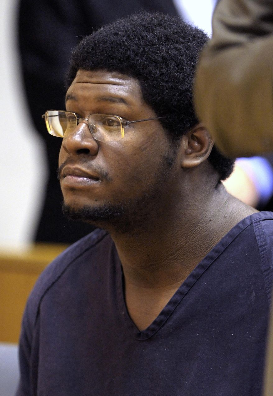 FILE - In this June 8, 2012, file photo, James Brown listens as his preliminary hearing is delayed in Sterling Heights, Mich. Brownn was convicted on Friday, Feb. 28, 2014, of first-degree murder, arson and disinterment of a body. He faces mandatory sentence of life in prison without parole for killing four women in his basement and stuffing their bodies in car trunks after he met them through online escort ads. (AP Photo/Detroit News, Todd McInturf ) DETROIT FREE PRESS OUT; HUFFINGTON POST OUT