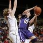 Washington guard Kelsey Plum (10) shoots next to Stanford forward Mikaela Ruef during the first half of an NCAA college basketball game on Thursday, Feb. 27, 2014, in Stanford, Calif. (AP Photo/Marcio Jose Sanchez)