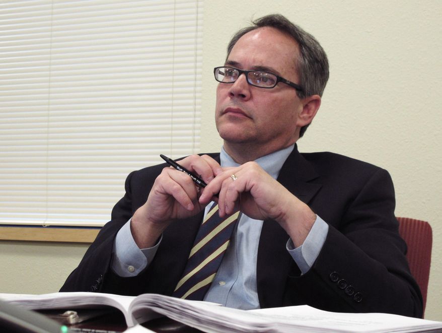 FILE - In this Feb. 9, 2012 file photo, Grant Shaft, a member of the North Dakota Board of Higher Education, is seen at Bismarck State College in Bismarck, N.D. Shaft says he's worried about possible repercussions from the Legislature over the way the sale of a University of North Dakota building was handled. The board was supposed to sign off on it but interim Chancellor Larry Skogen says he didn't know about that and approved the deal. (AP Photo/Dale Wetzel, File)