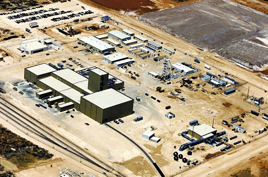 FILE - This undated file aerial photo shows the Waste Isolation Pilot Plant near Carlsbad, N.M. Back-to-back accidents and a never-supposed-to-happen above-ground radiation release have shuttered the federal government’s only deep underground nuclear waste dump indefinitely, raising questions about a cornerstone of the Department of Energy’s $5 billion-a year-program for cleaning up legacy waste scattered across the country from decades of nuclear bomb making. Thirteen workers have tested positive for radiation exposure after a recent leak. (AP Photo/Carlsbad Current Argus, File)
