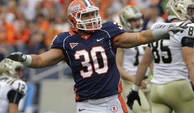 FILE - In this Sept. 24, 2011 file photo, Illinois linebacker Houston Bates (30) celebrates after making a tackle during an NCAA college football game against Western Michigan in Champaign, Ill. In a statement Friday, Feb. 28, 2014, Bates says he is leaving the team to try to find a school closer to his home in Louisiana for his final season. (AP Photo/Seth Perlman, File)
