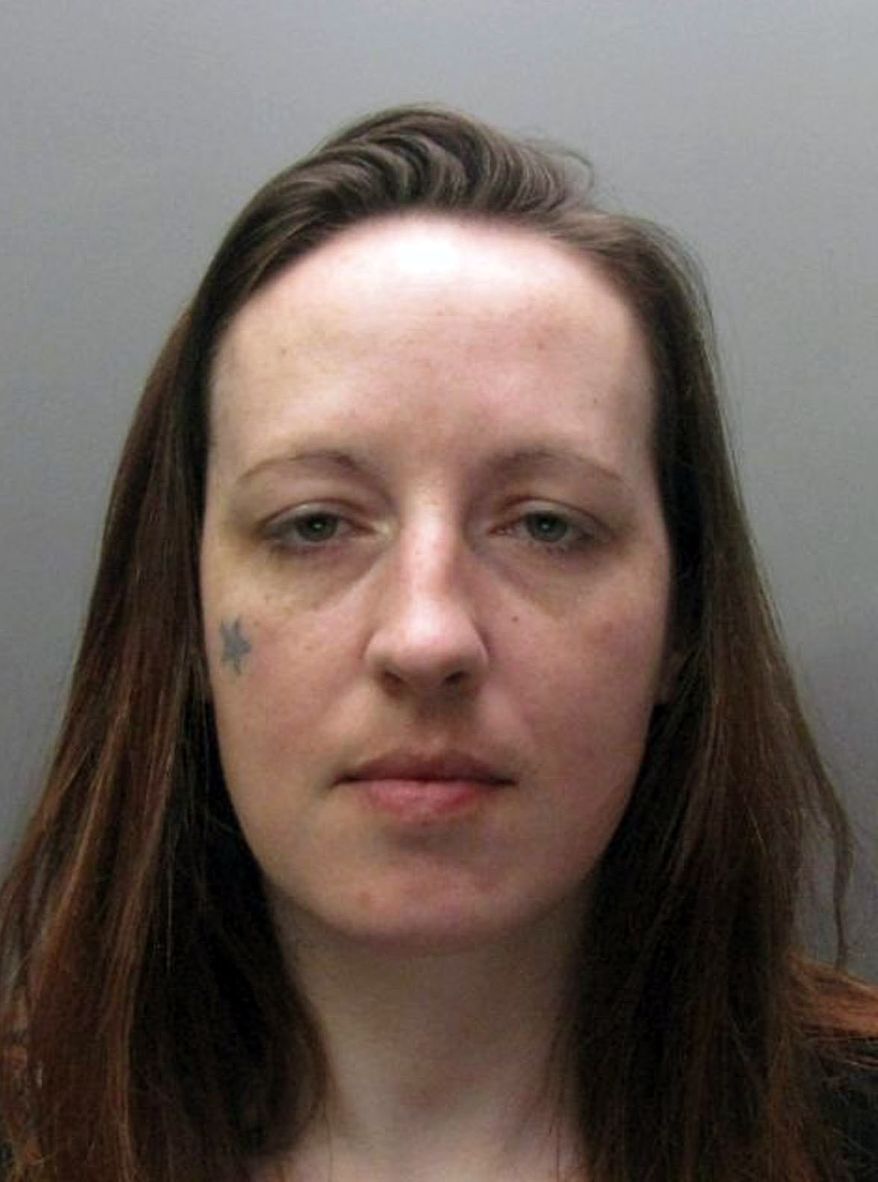 In this undated photo made available by Cambridgeshire Police, a photo of Joanna Dennehy. A British judge has told a woman who killed three men and attacked two others during a 10-day spree that she will never be released from jail. Joanna Dennehy smirked as she was sentenced Friday, Feb. 28, 2014, by judge Robin Spencer to life with no possibility of parole. Dennehy had pleaded guilty to murdering three men whose bodies were found in rural ditches in eastern England. After stabbing them to death in March, she drove to Hereford in western England where she stabbed and injured two strangers out walking their dogs. (AP Photo/ Cambridgeshire Police)